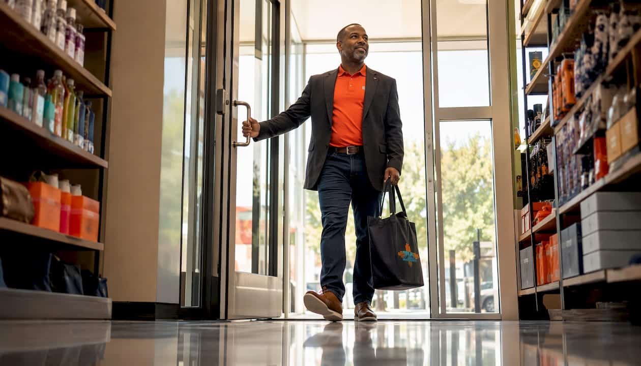 Customer entering spotless retail store entrance