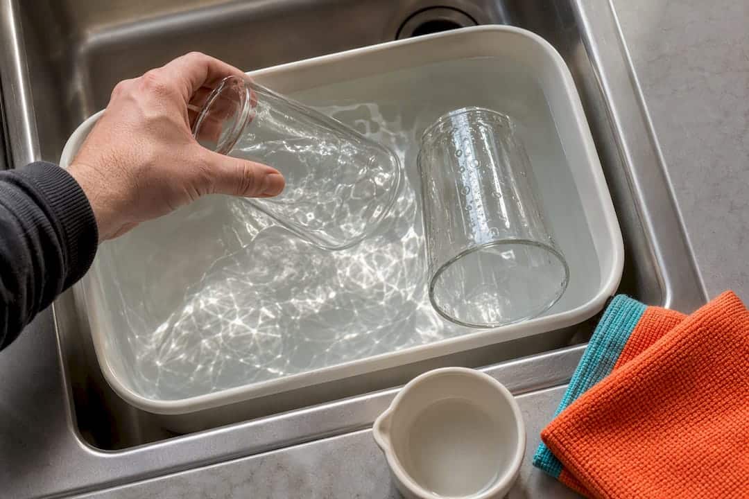 Glassware soaking in vinegar solution