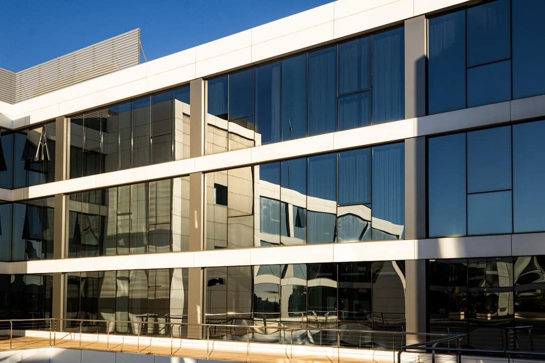 crystal clear commercial building windows reflecting natural daylight